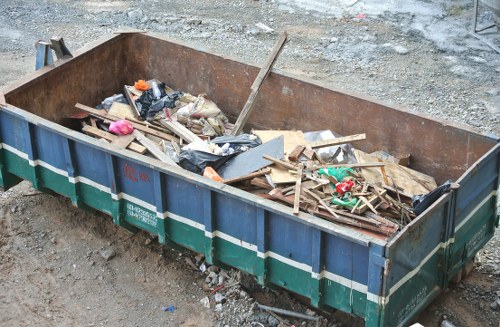 Construction site with waste being cleared in Kentish Town